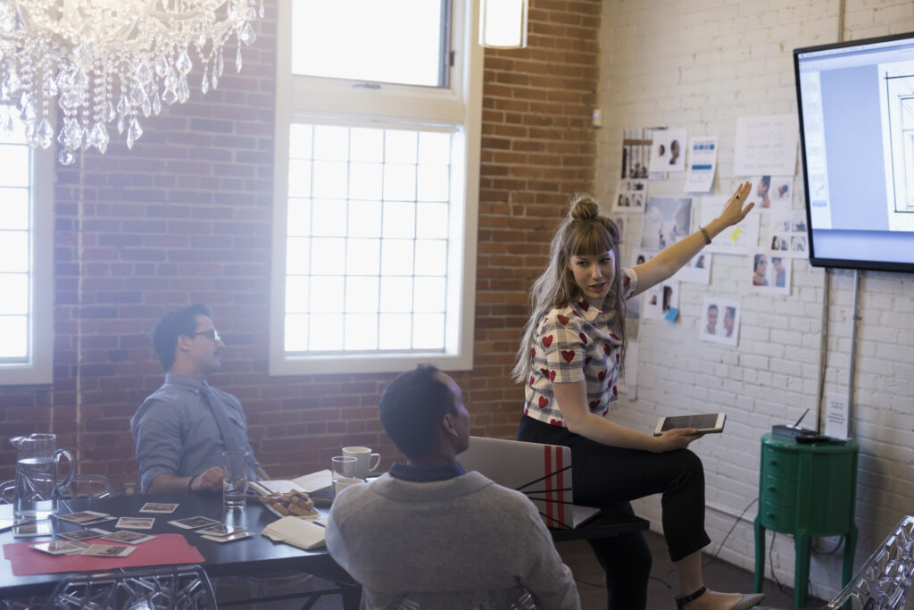 Designers brainstorming in conference room