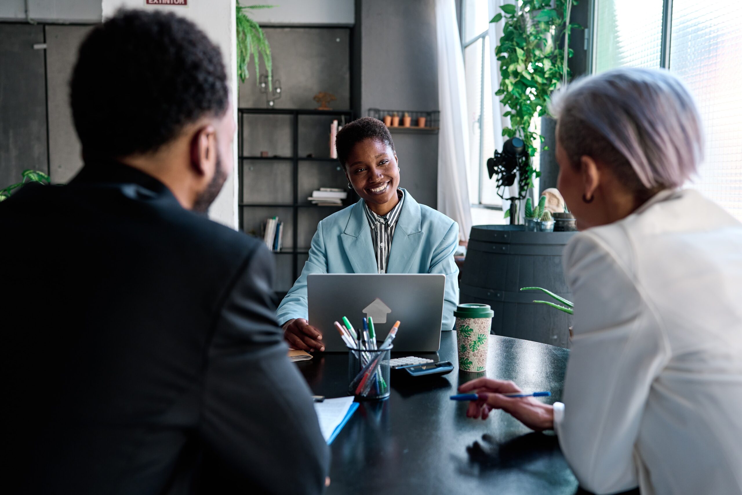 Financial advisor meeting with clients in the office